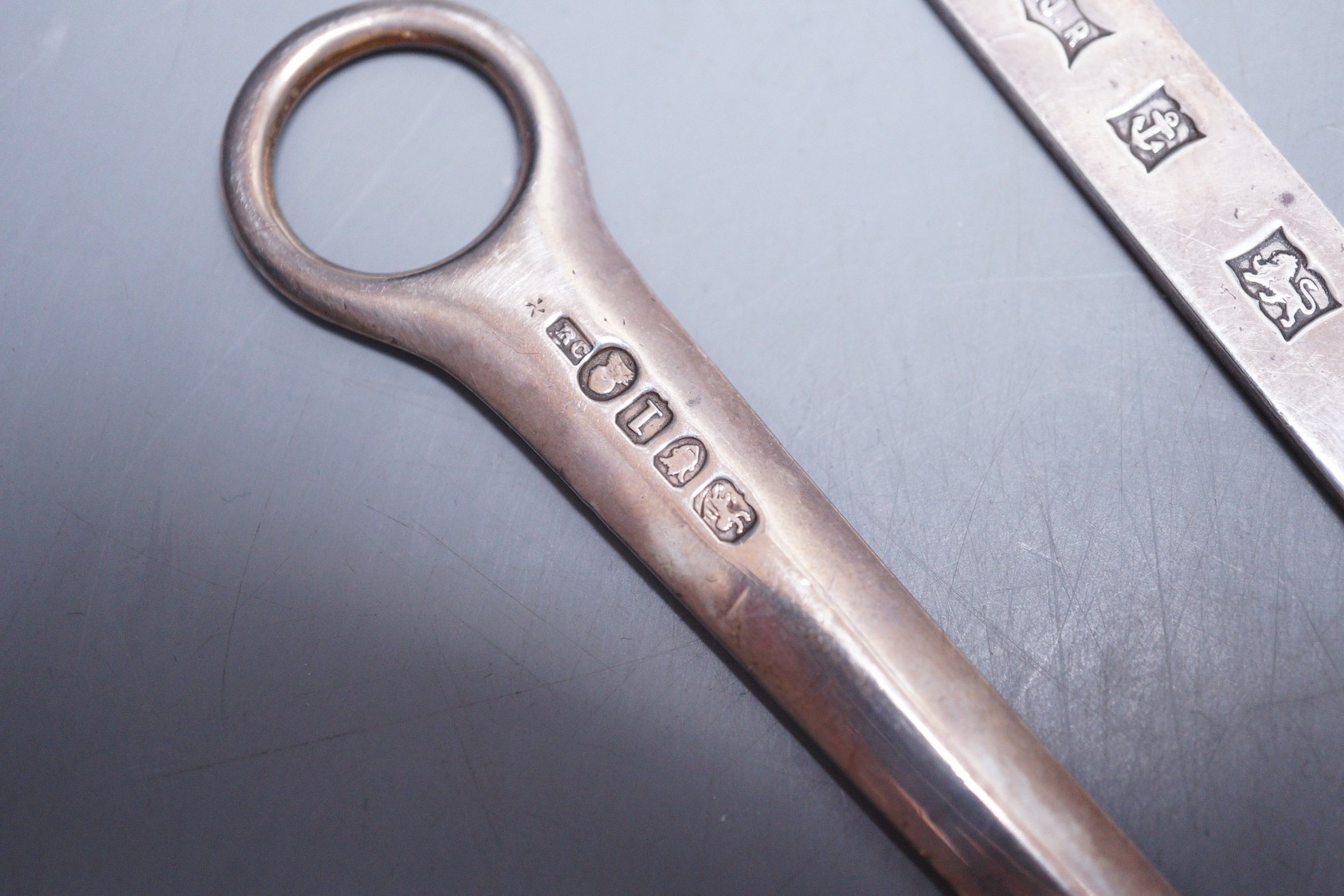 A George III silver meat skewer, Richard Crossley, London, 1786, 28,2cm and a modern silver letter opener by S.J. Rose.